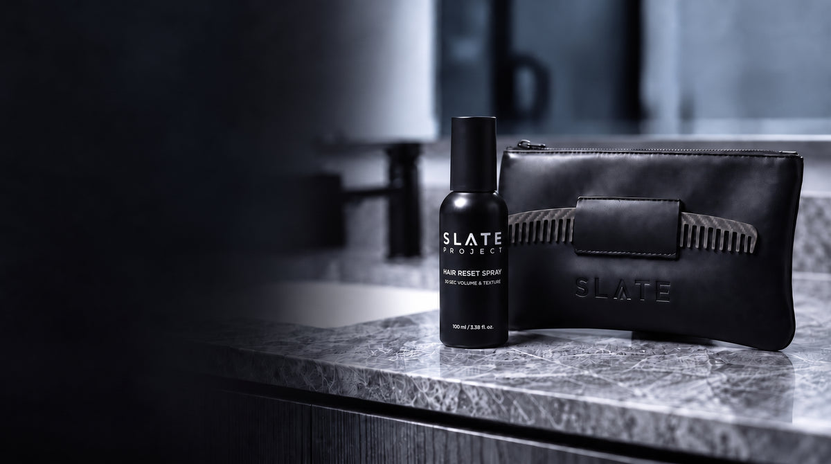 SLATE grooming system arranged in a dark bathroom setting.