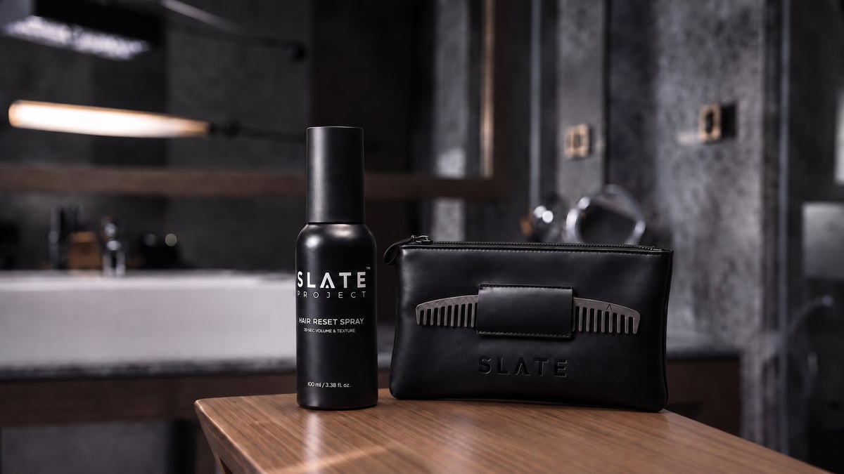 SLATE Complete Reset System displayed on a wooden counter in a dark bathroom setting.